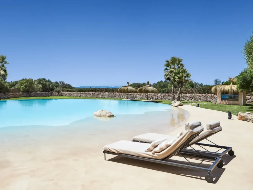 Luxury villa pool with relaxation area at Eden Roc in Es Trenc Mallorca