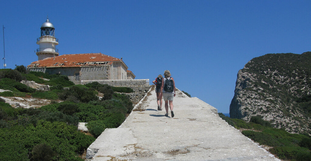 Scenic walking trail on Sa Dragonera leading towards the island lighthouse