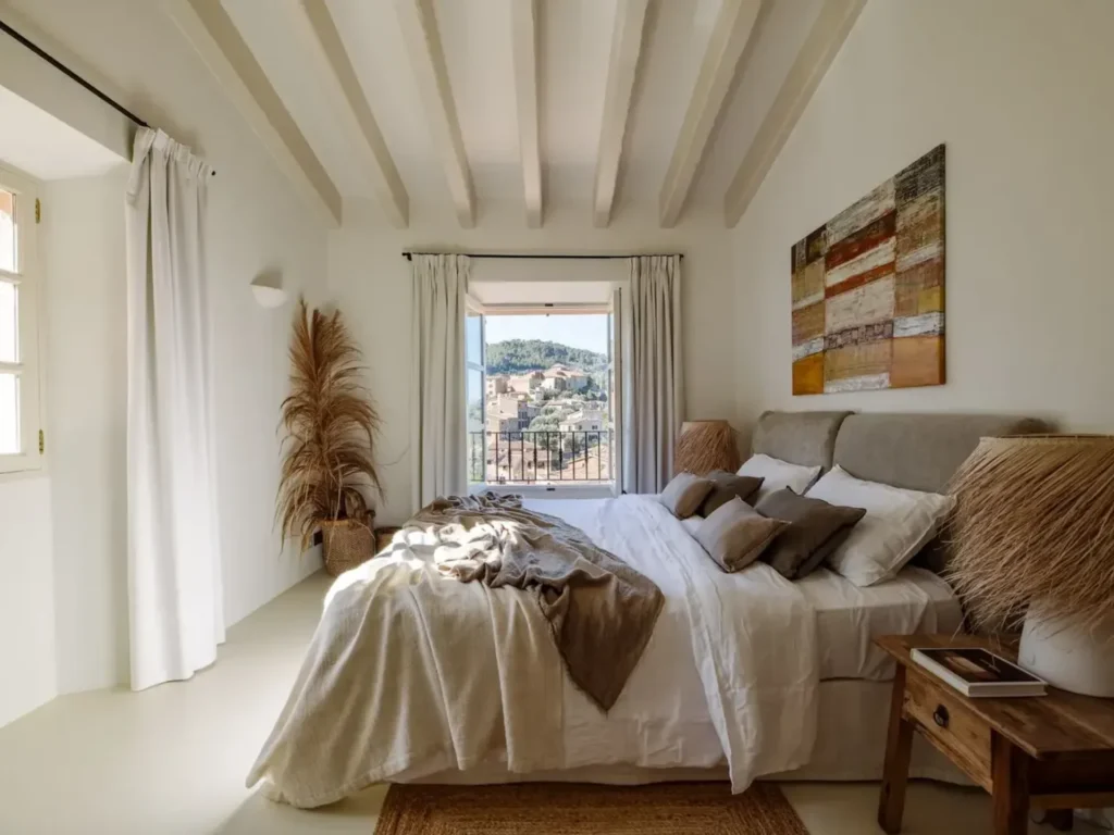 Luxury bedroom suite at Villa Sa Llupia in Mallorca with Deia views